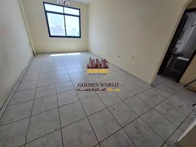Apartment for annual rent in Al Qasimia, Al Mahatta, with free AC, a stunning view, and a family residential tower.