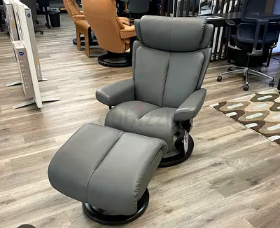 Original leather Stressless magic brand armchair with ottoman