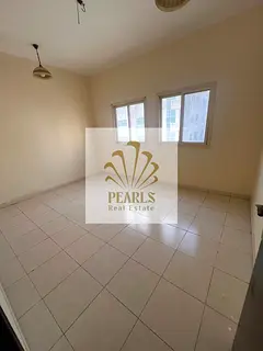 2BR Apartment for Annual Rent Ajman Al Naimiya King Faisal Street Balcony Central AC 2 Baths AED 33k