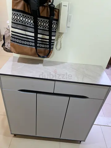 Sleek shoe cabinet