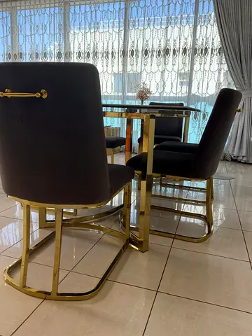 Glass Top Dining Table with 6 Velvet Chairs and Gold Frame