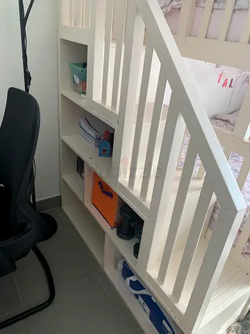 White Baby Crib with Built-in Storage Shelves
