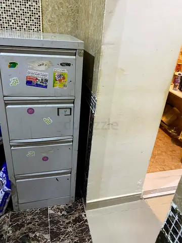 Used 4-Drawer Metal Filing Cabinet - Grey