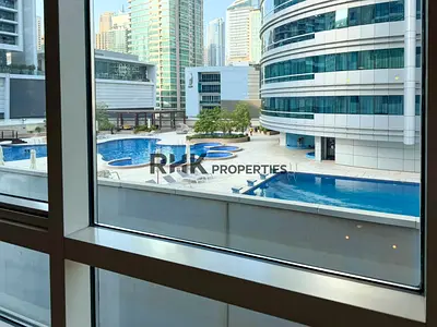 Semi Furnished | Low Floor | Pool Views | Vacant