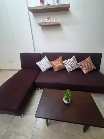 Brown L-shaped Sofa with  Cushions - Good Condition