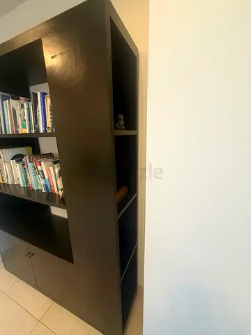Sturdy bookcase with cupboards and side display/storage