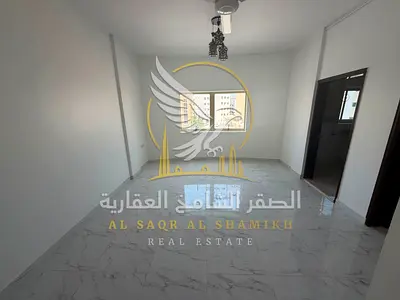 Spacious one bedroom apartment and living room for annual rent in Al Qulayaa Sharjah with central air conditioning and gas Large area quiet
