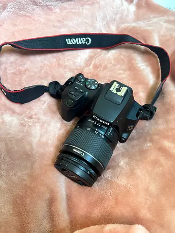Canon EOS DSLR with 18-55mm Lens
