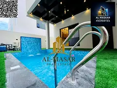 Excellent villa in Al Bahia area, Ajman, with a private pool, distinctive design, freehold ownership