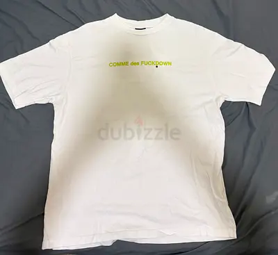 White graphic T-shirt "COMME des $%&!#$%&" — casual men's tee, good used condition