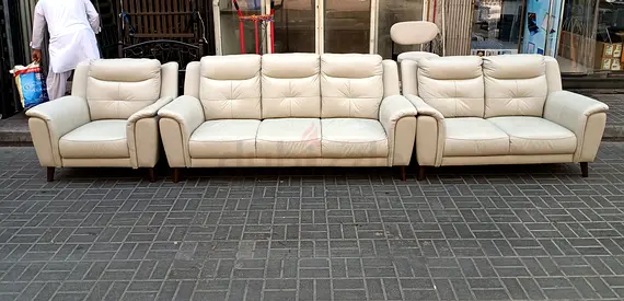 Beige leather 3-seater sofa with 2 matching armchairs — good condition