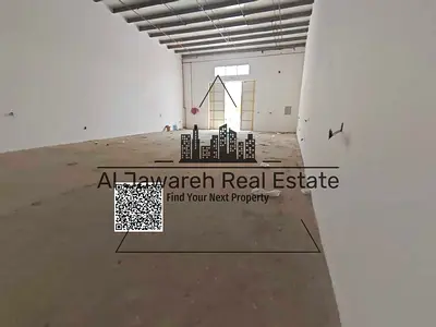 For rent: Two adjacent warehouses—never before used—suitable for all types of business activities, located in Al Jurf 1, Ajman