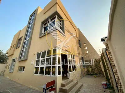 Luxury Independent Villa for Rent in Al Jazzat with Spacious Garden and Covered Parking