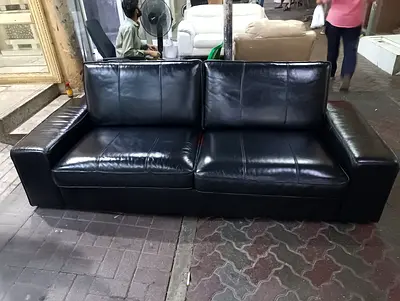 Black leather 3-seater sofa in good used condition