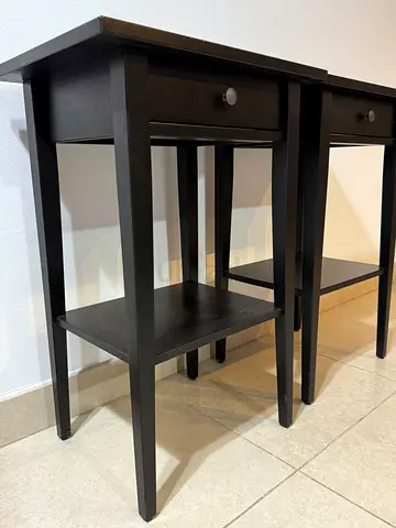 Pair of black wooden bedside tables with drawer and shelf