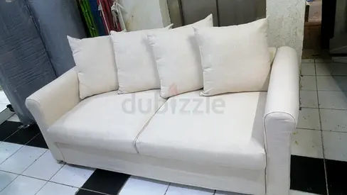 Light Beige 2-Seater Sofa bedbwith Cushions - Good Condition
