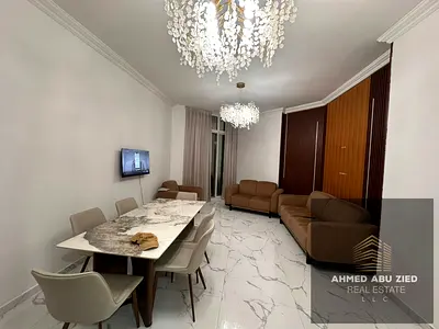 Two master bedrooms, large furnished living room, gym, swimming pool, garden, private parking, spacious kitchen, three bathrooms, maid's room, balcony