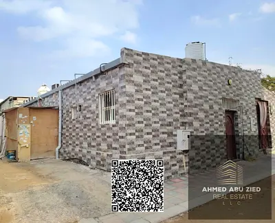 For Sale: Corner Arabic-style house on Street & seka in Al-Rashidiyah, 3-bedroom, residential and investment property