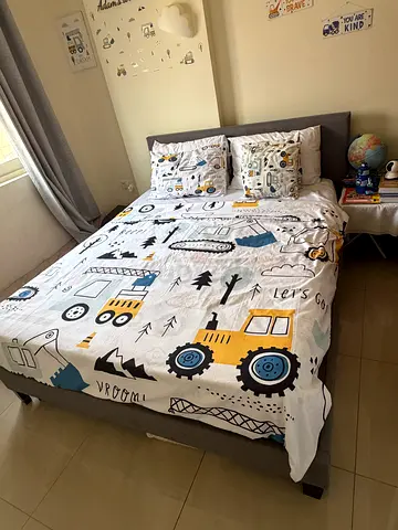 Gray bed frame with orthopaedic mattress
