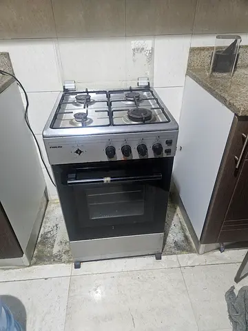 Used 4-Burner Gas Stove with Oven - Good Working Condition
