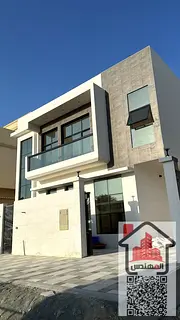 Two-story villa for rent in Ajman, Al Yasmin area. 5 master bedrooms, living room, majlis, and maid'