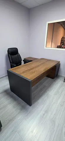 Executive wooden office desk with matching modesty panel and storage