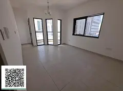 A guy living in a one-bedroom apartment with a great space, closed living room with a balcony, one b
