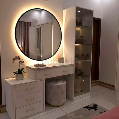 White bedroom vanity set with illuminated round mirror and glass display cabinet