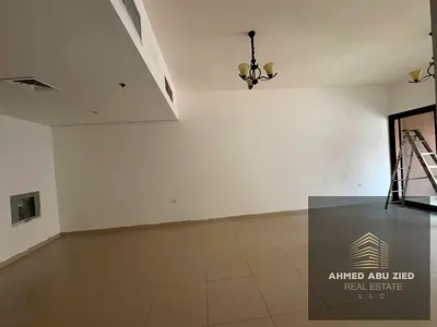 Extra-large 1BHK for annual rent in Ajman, with a master bedroom, balcony, open view, central A/C,