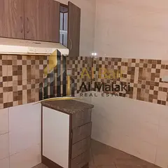 Beautiful 1-Bedroom Apartment for Annual Rent in Al Qasba with One Bathroom, Free Parking and One Mo