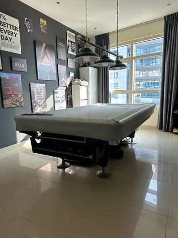 Full-size pool table with blue felt — good condition
