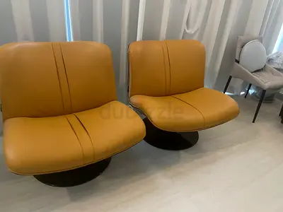 BRAND NEW Pair of mustard leather swivel lounge chairs - modern design