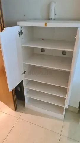 White Tall Storage Cabinet with Multiple Shelves - Good Condition