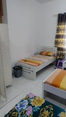 FEMALE BED SPACE (24 hour AC) near king Faisal road