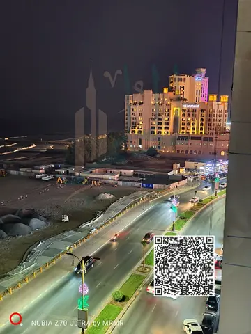 Furnished one-bedroom apartment with a living room on Ajman Corniche