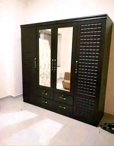 Brand new 4door wardrobe dark brown colour