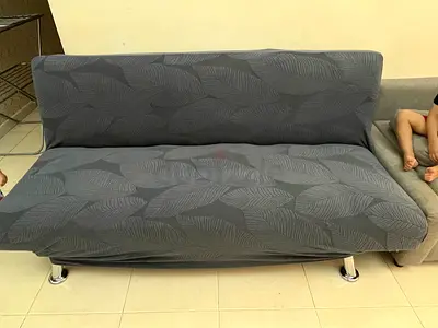 Grey foldable sofa bed / futon in good condition