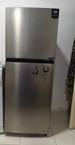 Silver double-door refrigerator (top freezer) - good condition