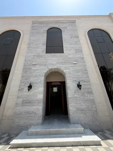 Two adjoining villas for sale in the Al Muzaira area, situated on a 36-meter-wide street.