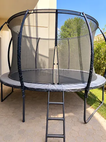 Outdoor trampoline 12 feet with safety enclosure and ladder