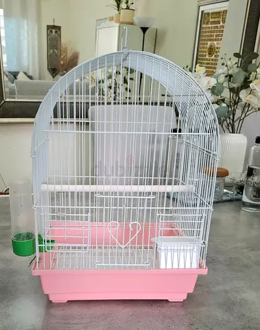 White & pink medium bird cage with accessories, good condition