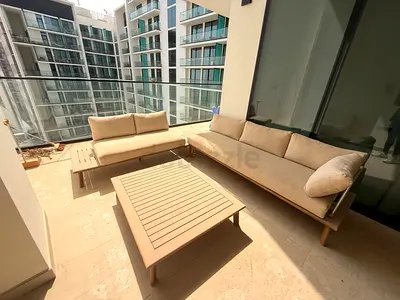 Outdoor patio sofa set with coffee table - beige cushions