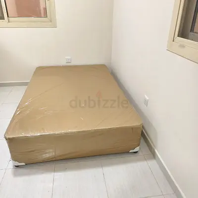 Used double mattress with base - good condition, still wrapped