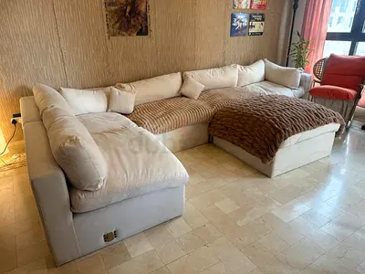 Large L-shaped Cream Fabric Modular Sofa with Ottoman