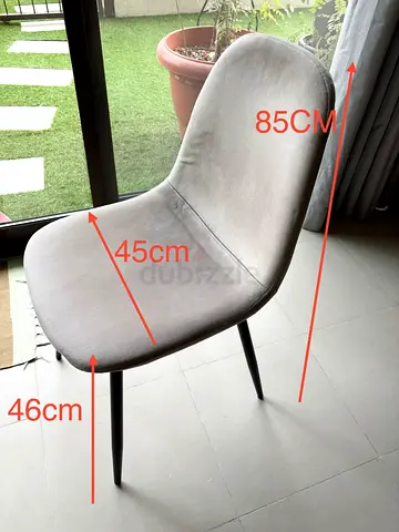 6 numbers of Grey upholstered dining/desk chair - 85cm height. 60 aed each.