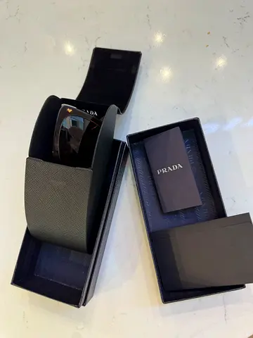 Prada cat eye designer sunglasses with original case and box made in Italy - flat type