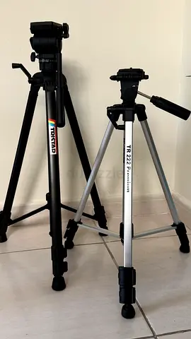 Two camera tripods (one heavy-duty, one compact) - excellent condition. Never used.