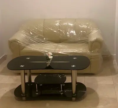 Two-seater cream leather sofa