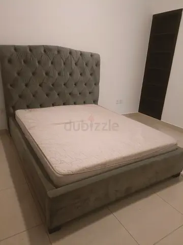 Queen upholstered bed frame with mattress, tufted headboard - good condition
