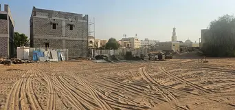 A plot of land for sale in Al Muwaihat 2, Ajman—opposite the Academy and the School District, and